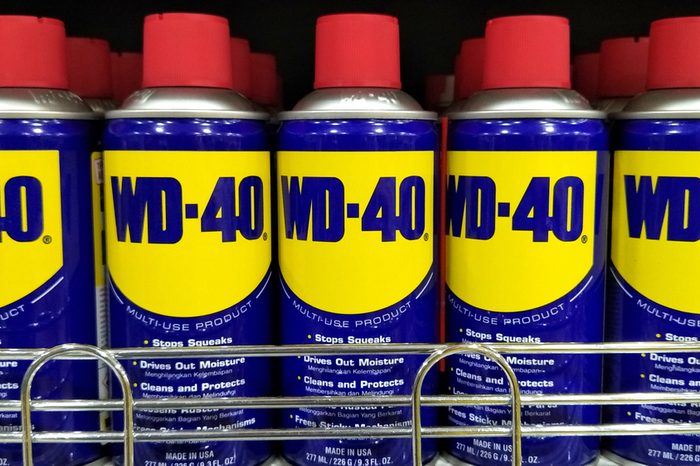 KUALA LUMPUR, MALAYSIA - DEC 24TH 2017: WD-40 canisters on the supermarket shelves. WD-40 is the trademark name of a penetrating oil and water-displacing spray.