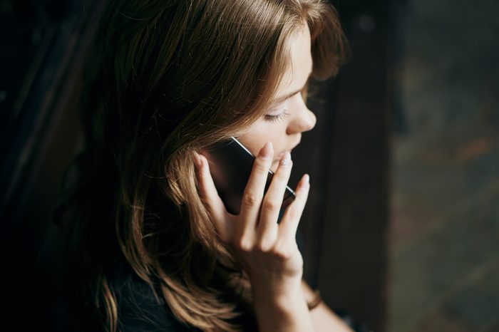 woman talking on the phone, park
