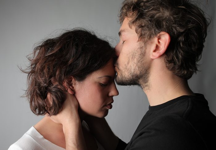 boyfriend comforts young female