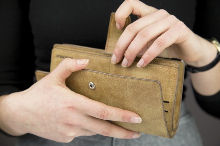 woman holding wallet
