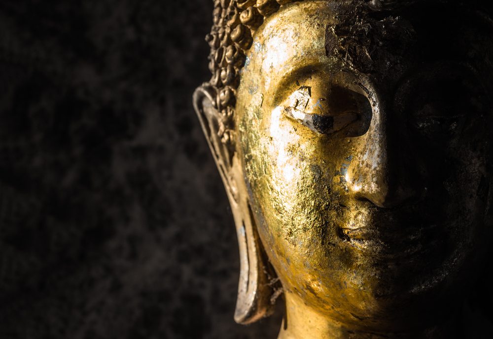 Face of statue Buddha close up at Wat Phra That Doi Suthep is a Theravada wat in Chiang Mai Province, Thailand. The temple is often referred to as Doi Suthep