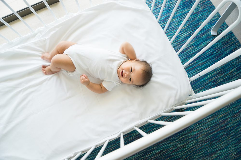 the top view of baby in cot, cradle