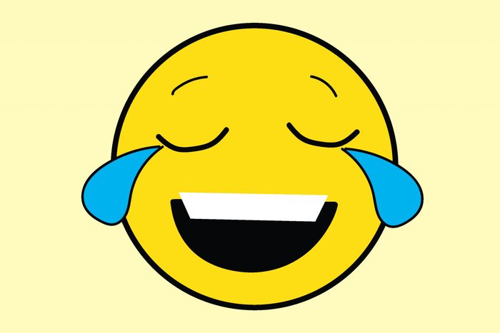 A yellow smiley face is laughing with eyes closed, tears of joy streaming down, set against a pale yellow background.