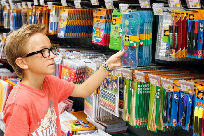 Child Getting School Supplies
