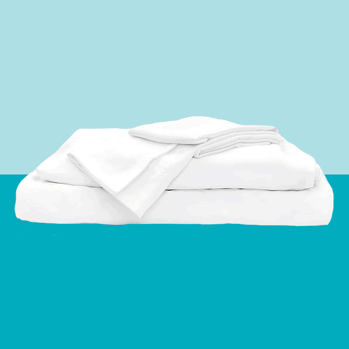 White bed sheets neatly folded on a turquoise surface, with a light blue background.