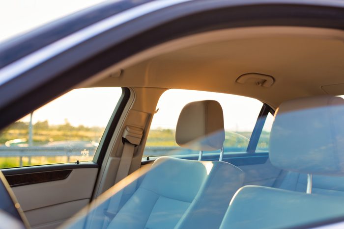 A car with the drivers window Half way down