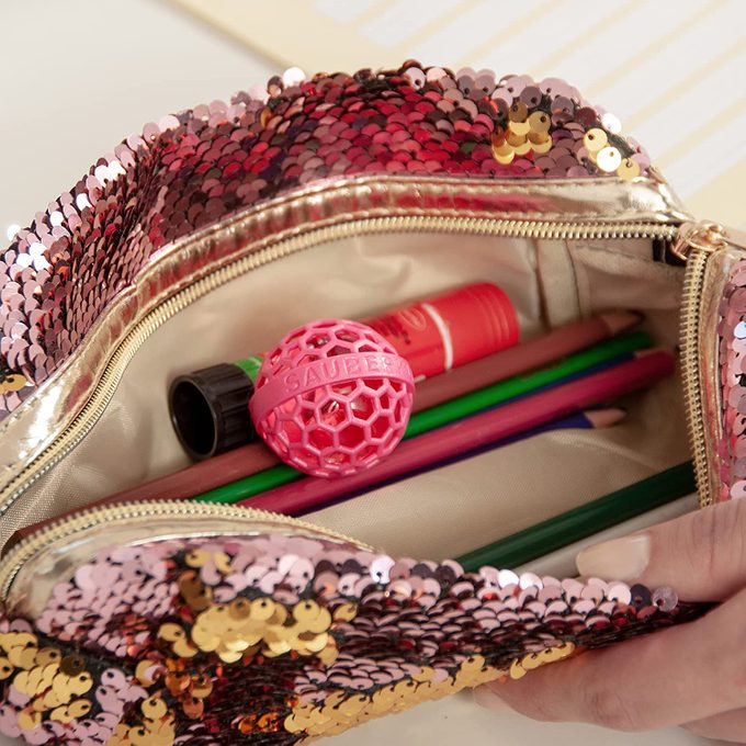 This Clever $13 Ball Keeps Your Purse Clean—Seriously!