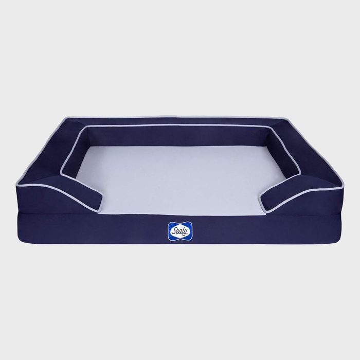 Rectangular dog bed with raised sides sits on white background; text 