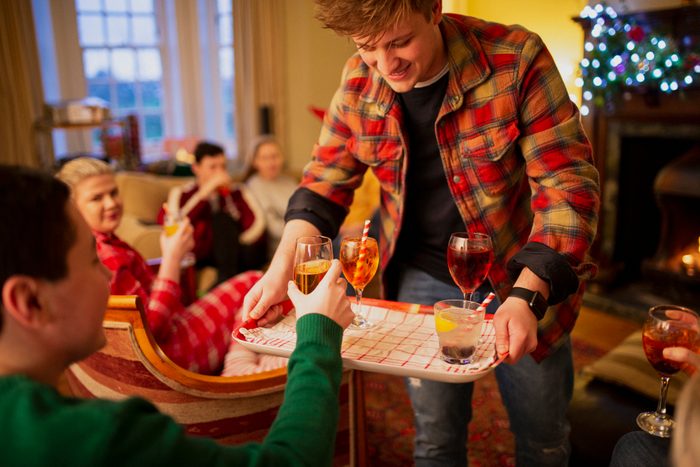 Serving Drinks at a Christmas House Party