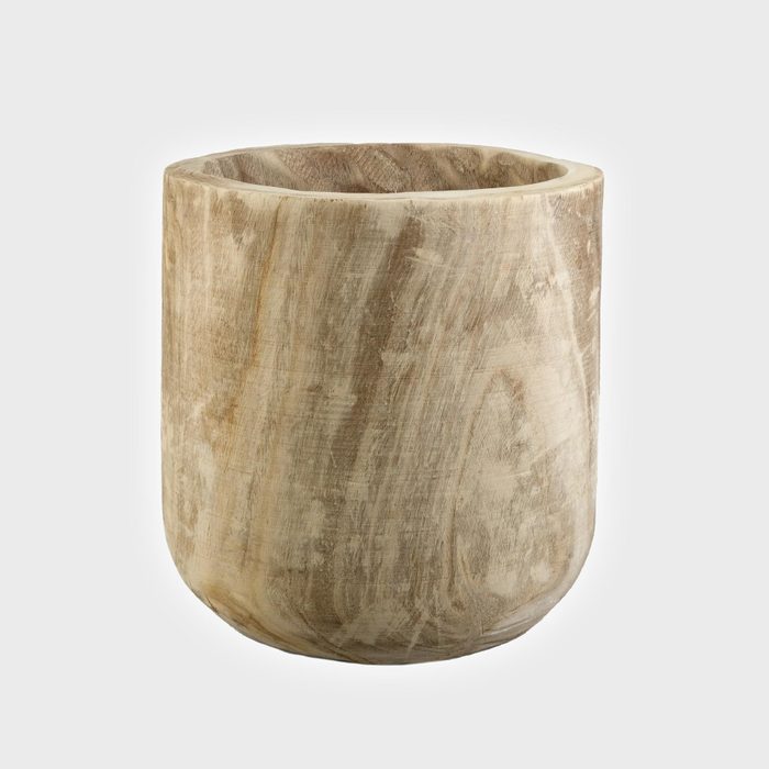 Wooden cylindrical planter with a natural grain texture, standing upright against a plain white background.