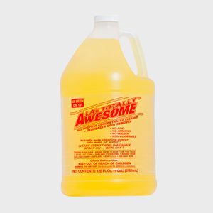 A yellow gallon jug labeled â€œLA's Totally Awesomeâ€ cleaner; promises multi-purpose use, no acid, ammonia, or bleach; claims to clean everything washable.