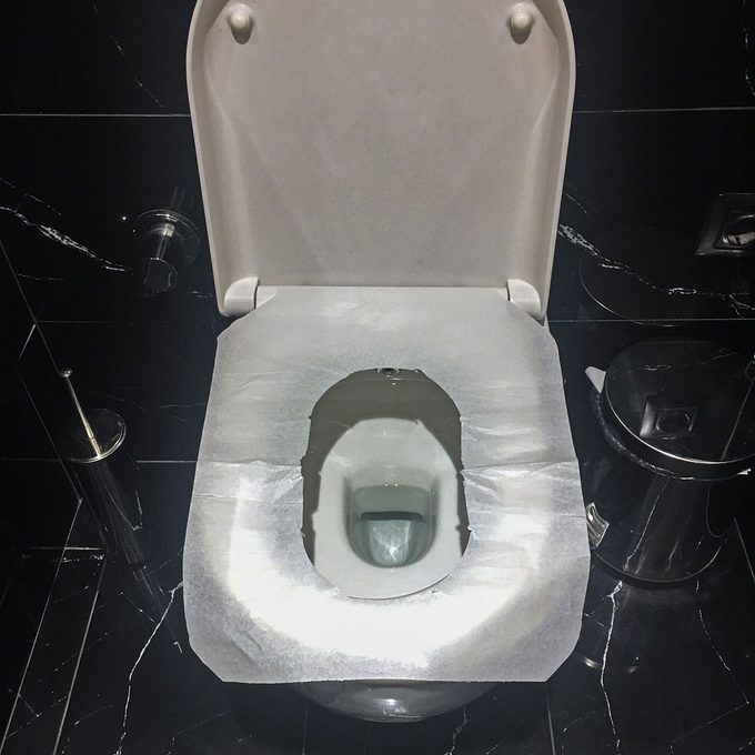 The Right Way to Use a Toilet Seat Cover (Yep, You’ve Been Doing It Wrong)