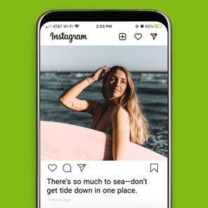 A smartphone displays an Instagram post of a surfer holding a board by the ocean. Text reads, 