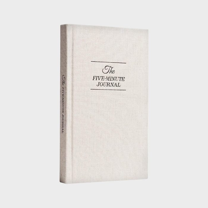 A linen-covered journal titled 