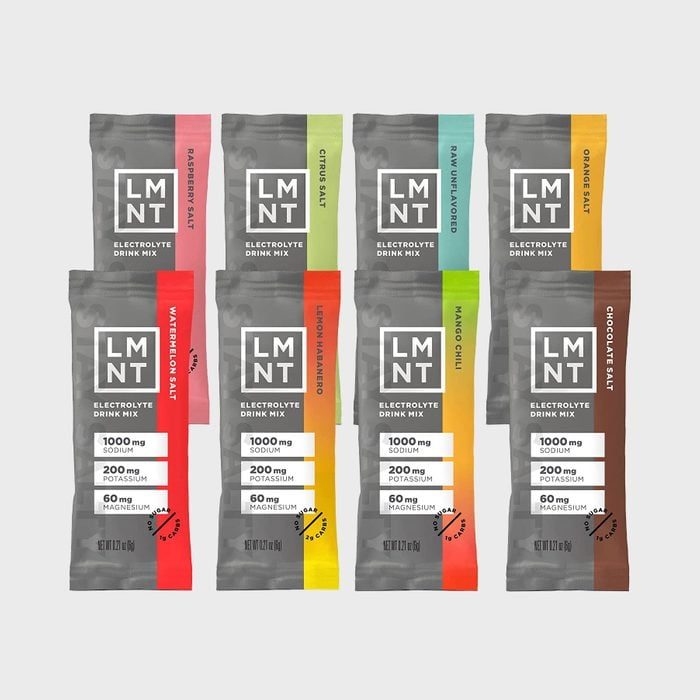 Packets of LMNT electrolyte drink mix arranged in rows display various bold flavors against a plain background.