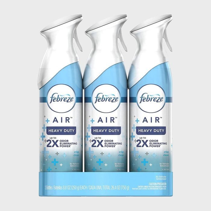 Three spray bottles stand together, labeled 
