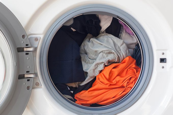Here’s How Long It’s OK to Leave Wet Clothes in the Washing Machine Before You Have to Rewash Them