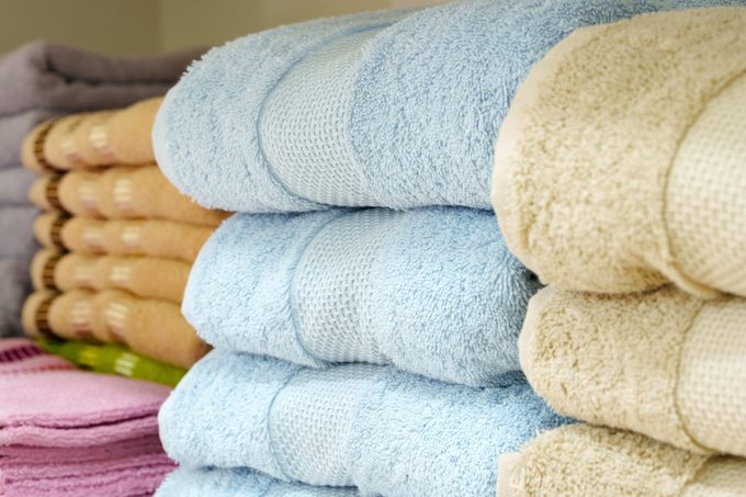Here’s Why Bathroom Towels Have Those Woven Strips on Both Ends