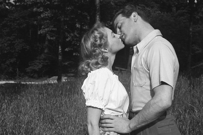 couple kissing outdoors