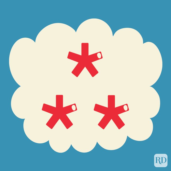 Asterism in the color red on a beige cloud on blue background.